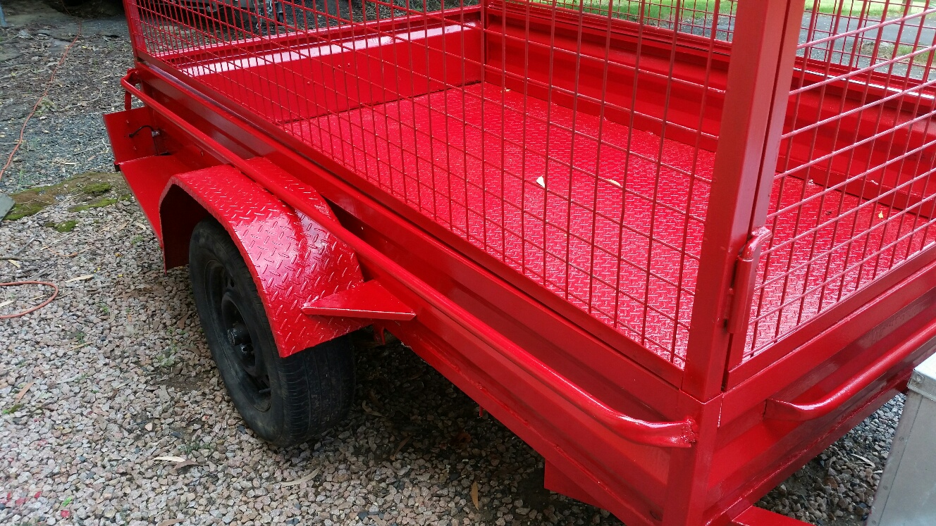 Box trailer with cage