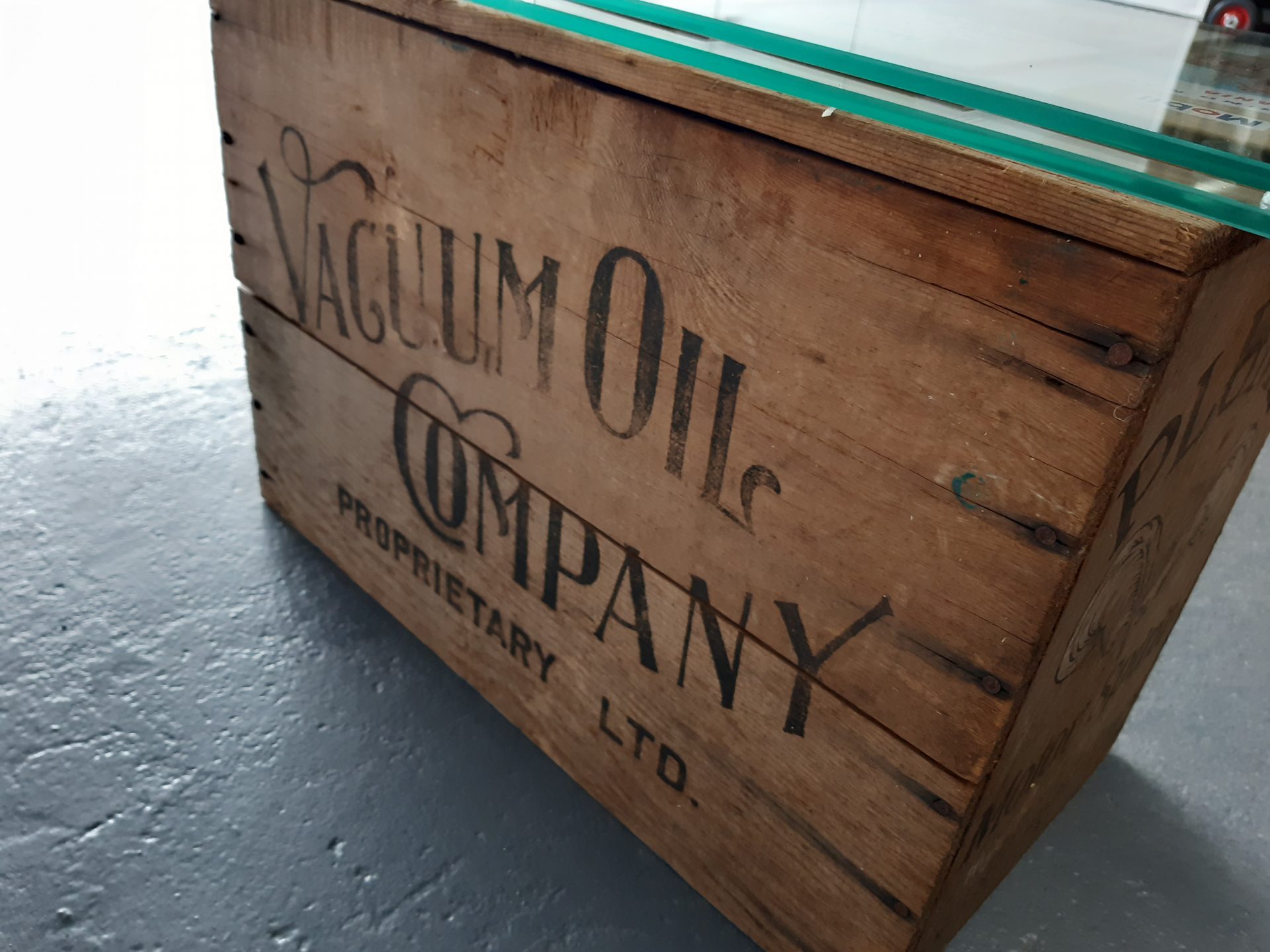 Vintage oil boxes coffee table with Glass top Vacuum oil company